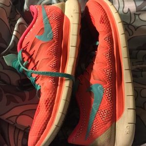 Nike Free 5.0 running shoes.